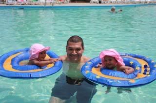 Daddy w/the girls at the pool in SC