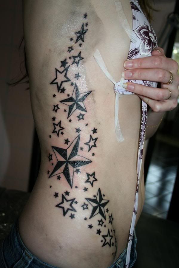 Hip Tattoos for girls - Flower & Star Design star-tattoo-120650882819430.jpg 