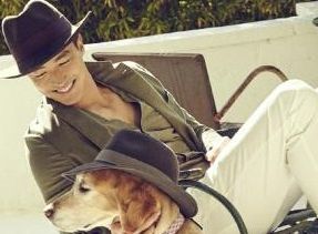 Oh Snap! Daniel Henney puts hat on dog
