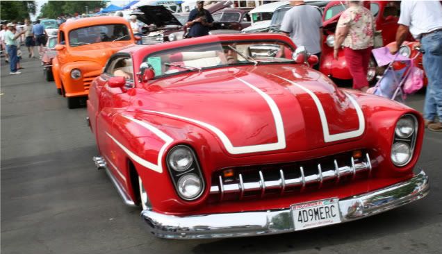 Photo A radically customized'49 Mercury leads several other cars past